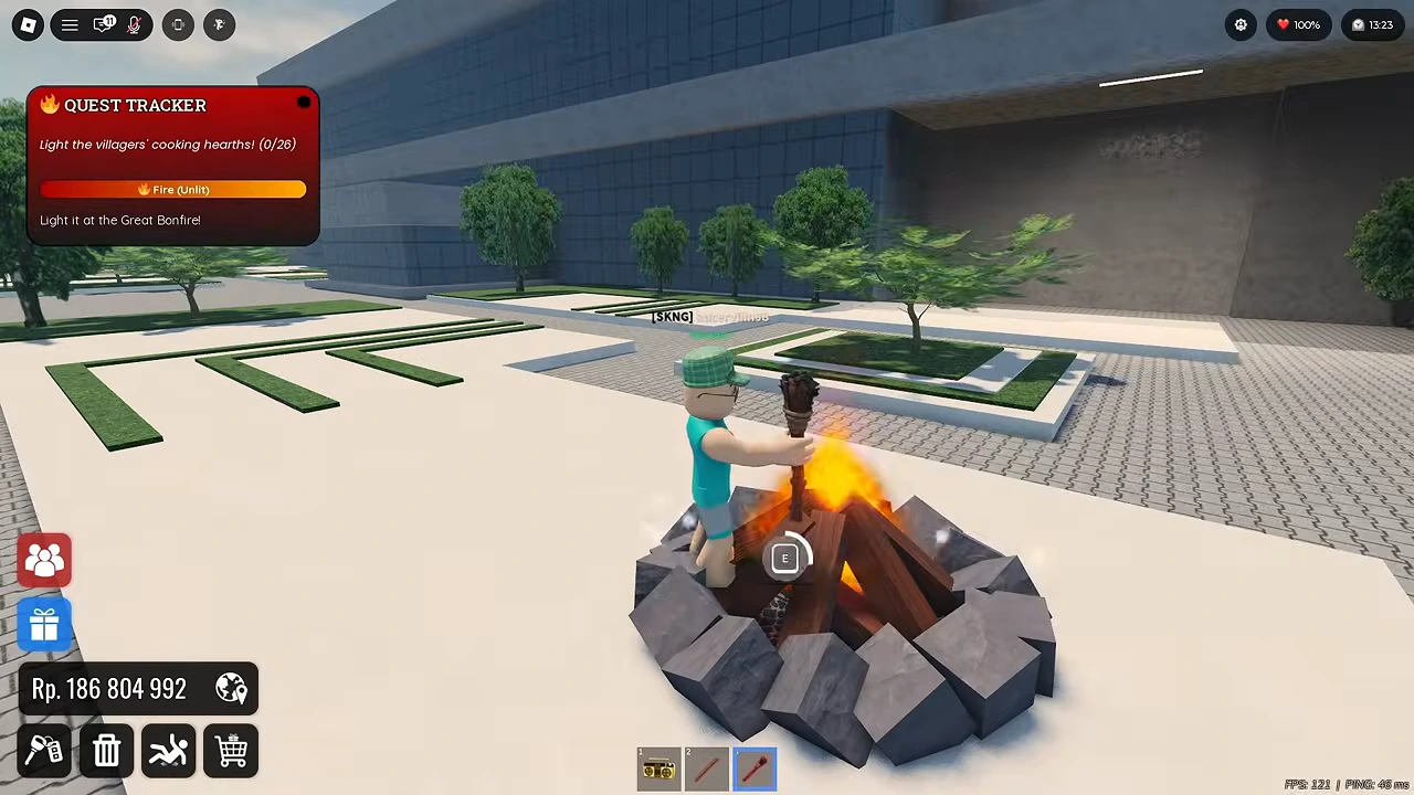 Unlit torch beside a Great Bonfire with an E interaction prompt